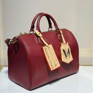 Женская дорожная сумка Louis Vuitton бордовая