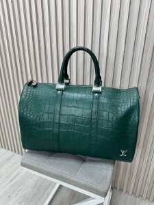 Крокодиловая дорожная сумка Louis Vuitton