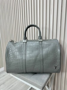 Крокодиловая дорожная сумка Louis Vuitton