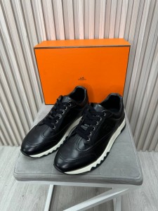 Кожаные кроссовки со вставками из натуральной замши Hermes Кожаные кроссовки со вставками из натуральной замши Hermes